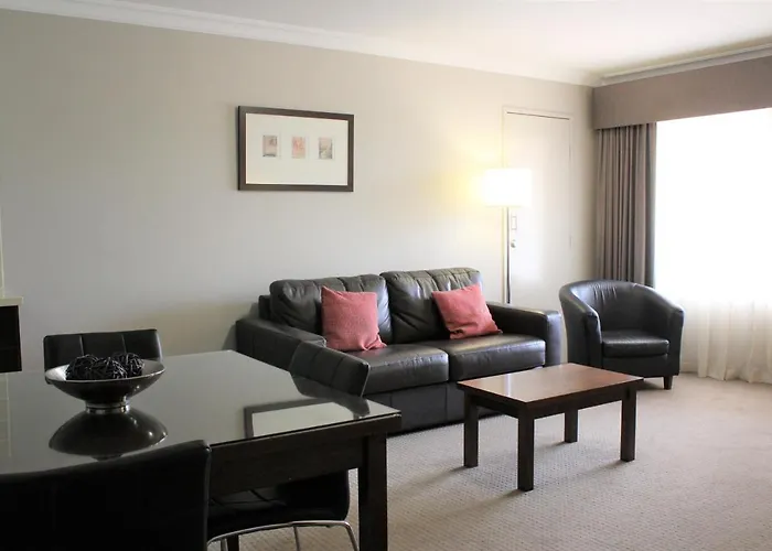 Carlyle Suites & Apartments
